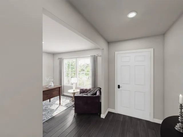 a room with furniture and a window