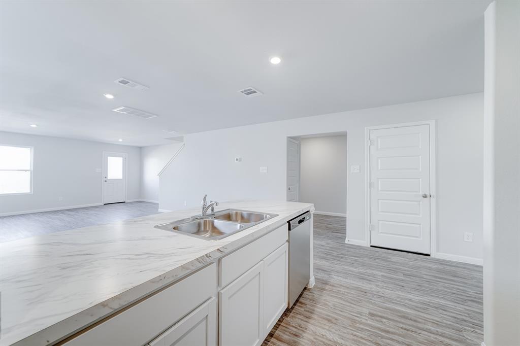 3525 Silver Springs Abilene, TX 79602 - Photo 10 of 20 a kitchen with sink and cabinets