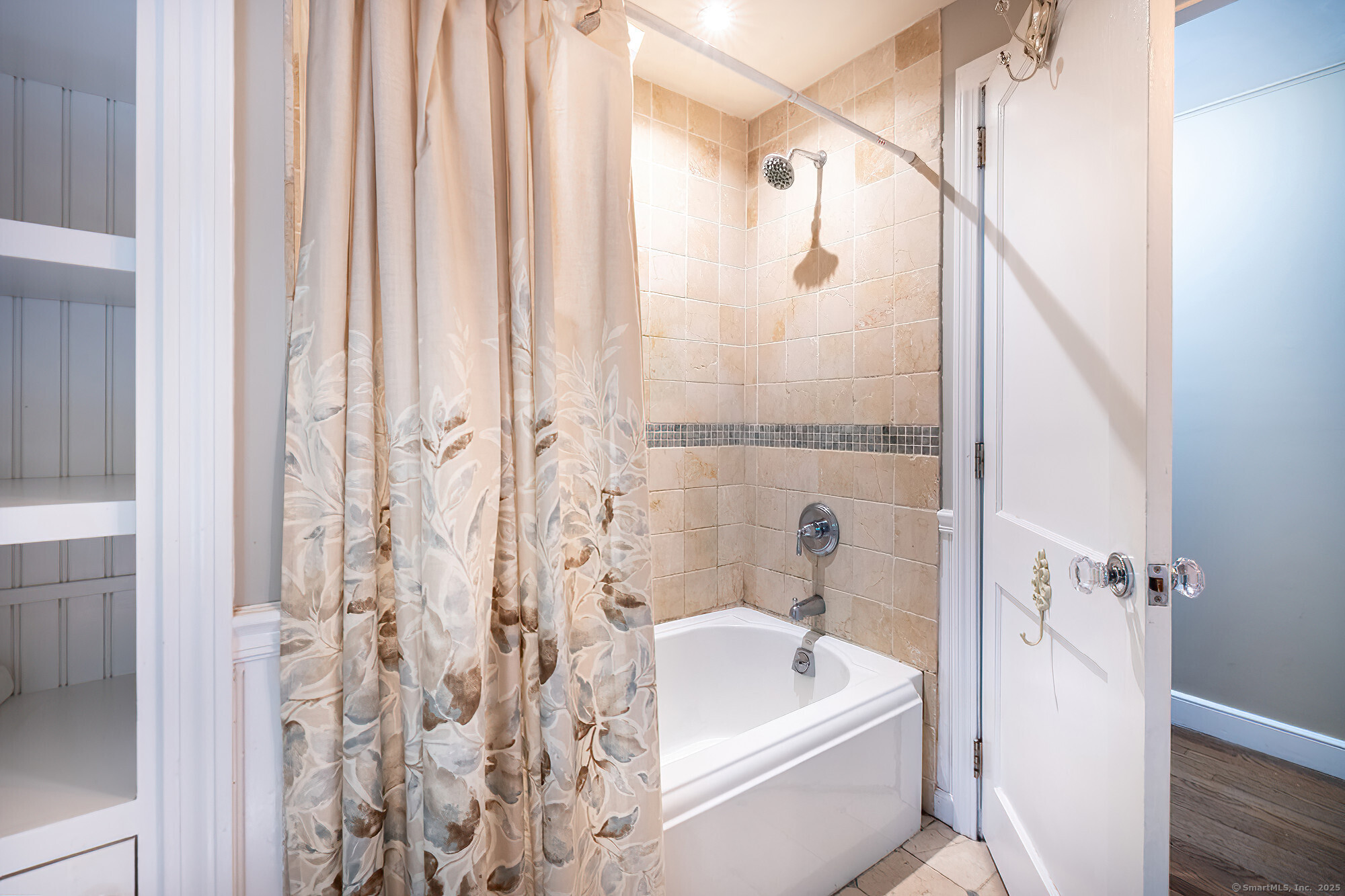 15 Laurel Hill Road Ridgefield, CT 06877 - Photo 25 of 34 a bathroom with a bath tub and shower