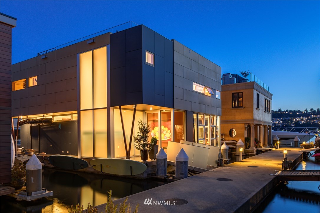 2369 Fairview Avenue East, Unit 6 Seattle, WA 98102 - Photo 1 of 26 a front view of a building with sitting area