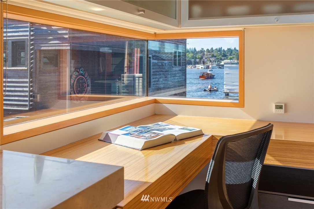 2369 Fairview Avenue East, Unit 6 Seattle, WA 98102 - Photo 12 of 26 a dining room with a table and chairs in it