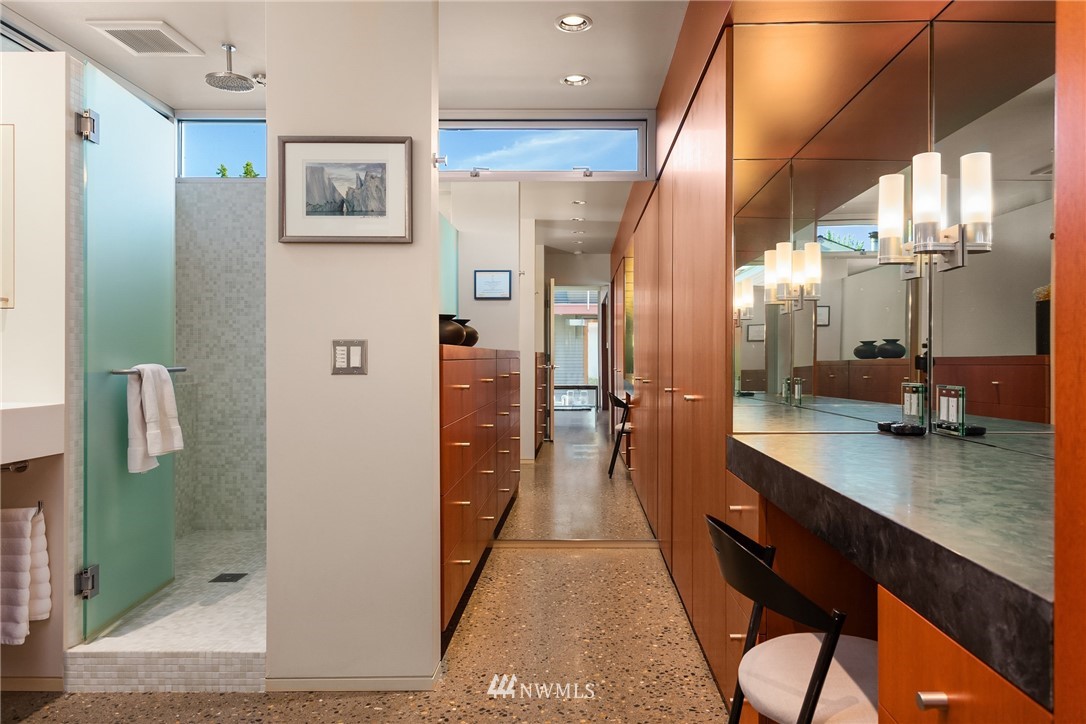 2369 Fairview Avenue East, Unit 6 Seattle, WA 98102 - Photo 15 of 26 a bathroom with a sink a toilet and shower