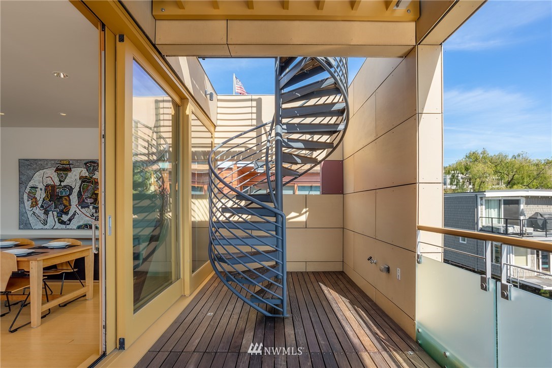 2369 Fairview Avenue East, Unit 6 Seattle, WA 98102 - Photo 6 of 26 a view of balcony with wooden floor