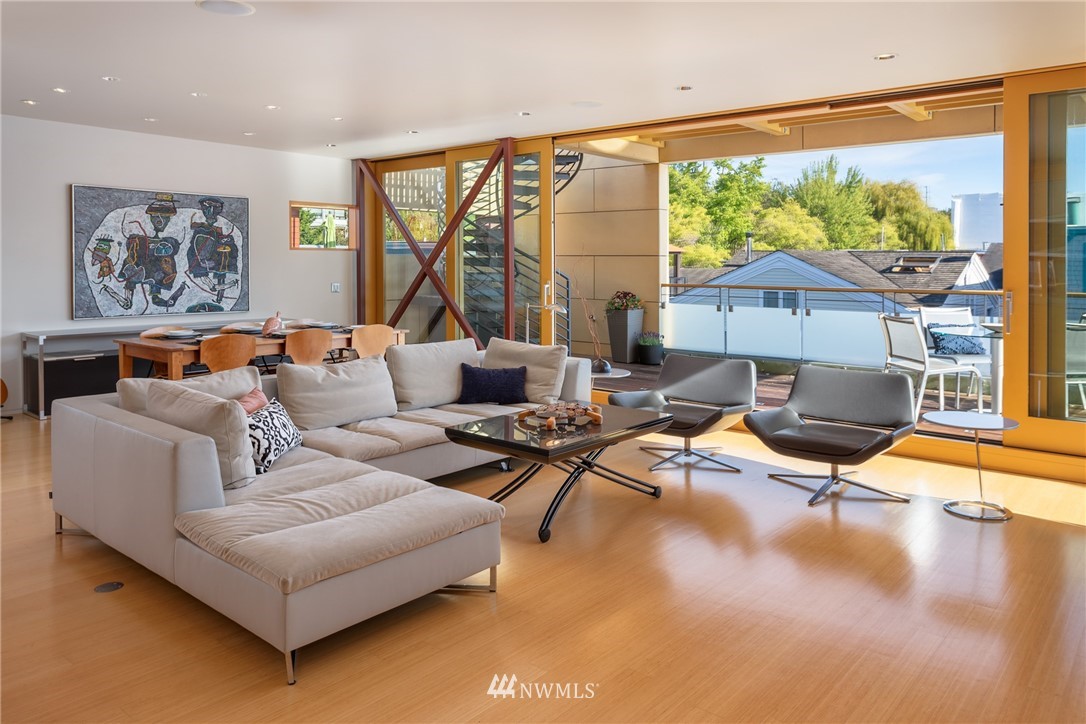 2369 Fairview Avenue East, Unit 6 Seattle, WA 98102 - Photo 9 of 26 a living room with furniture and a large window