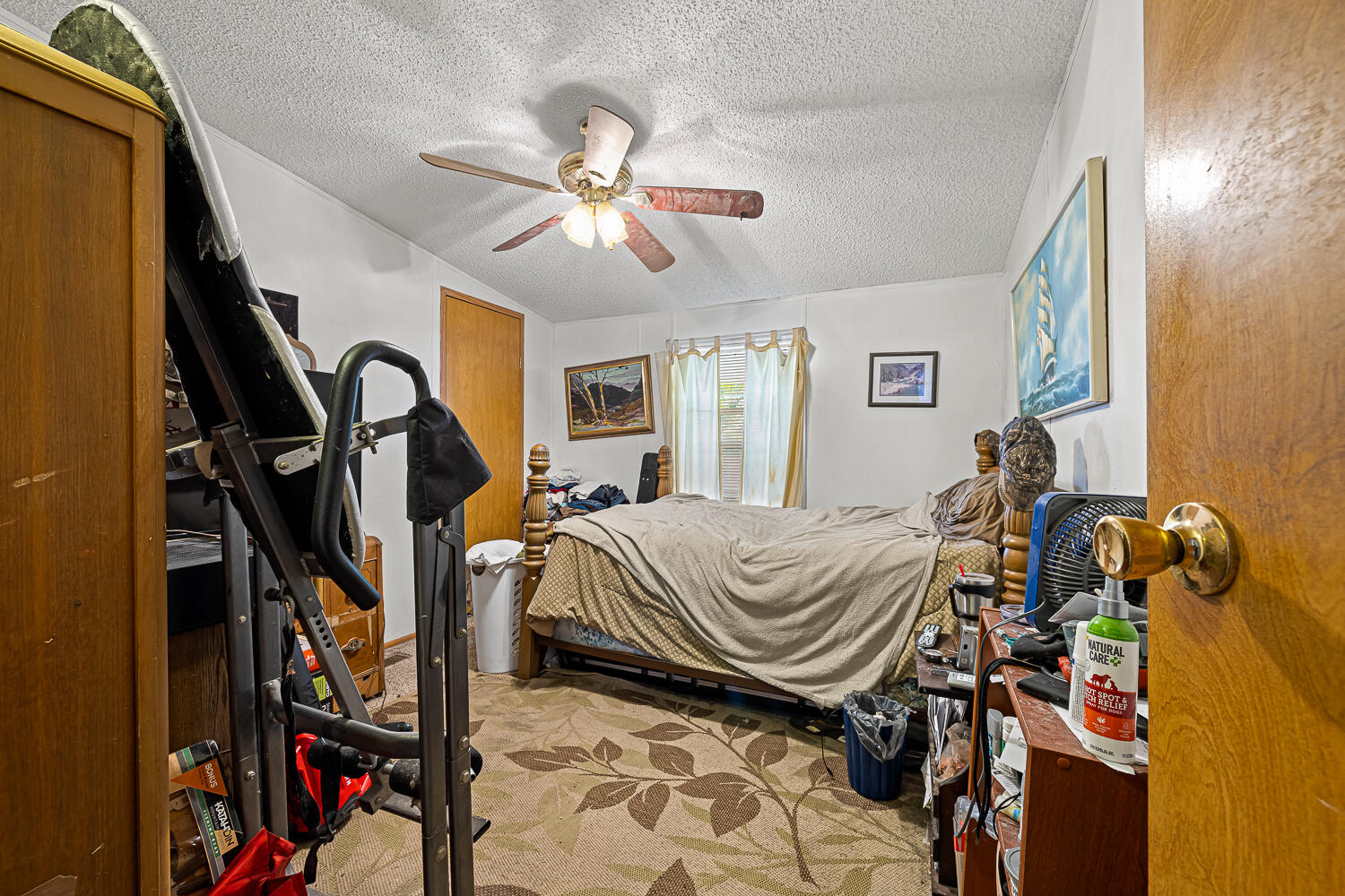 22958 Seaspray Place Boca Raton, FL 33428 - Photo 23 of 38 a bedroom with a bed and a chandelier