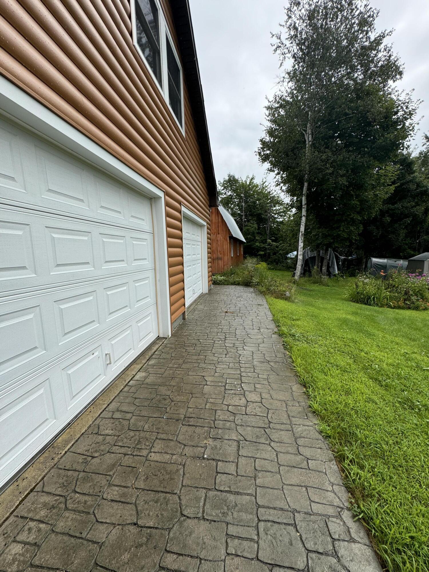 934 Milo Road Sebec, ME 04481 - Photo 47 of 52 Entry to Back of Garage