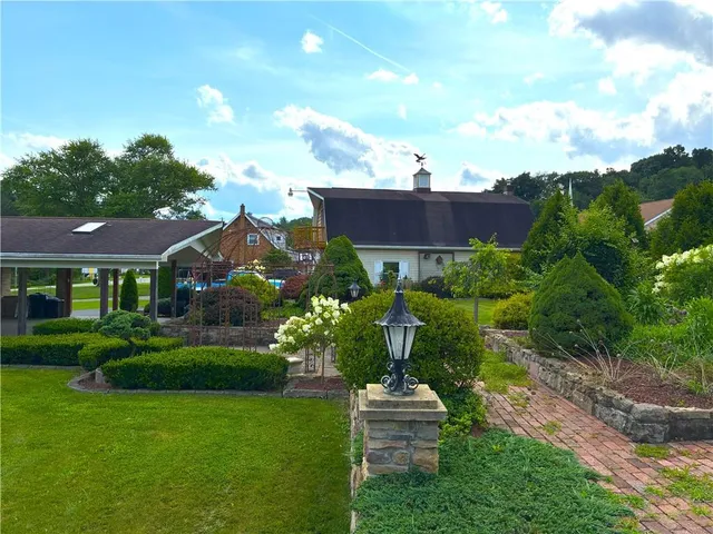 a house view with a garden space