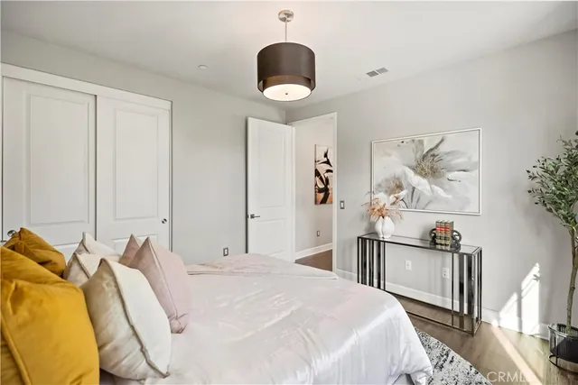 a view of a building with barbeque oven and seating space