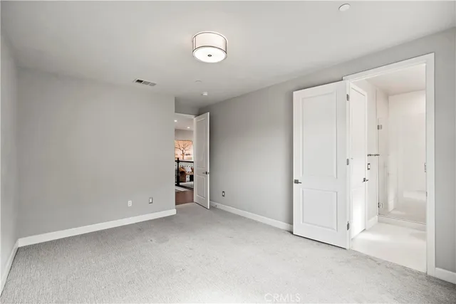 a bed room with a bed and a couch