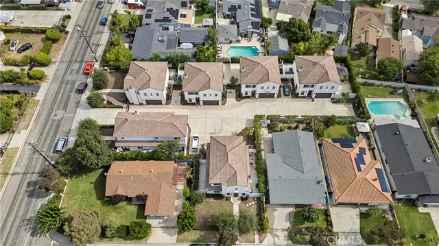 an aerial view of a houses with outdoor space