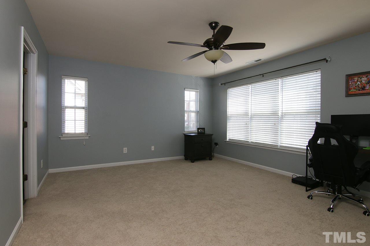 9820 Layla Avenue Raleigh, NC 27617 - Photo 13 of 17 a workspace with windows and ceiling fan