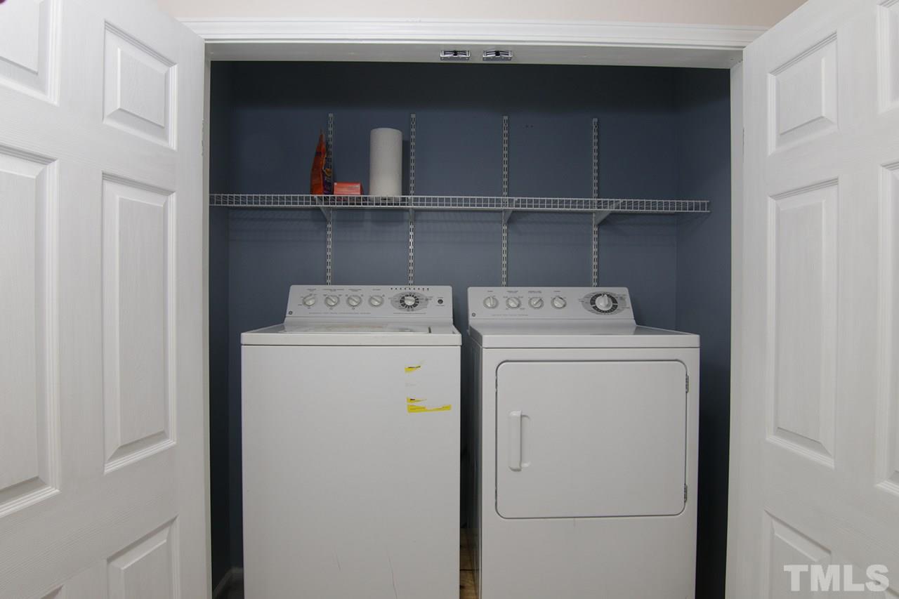 9820 Layla Avenue Raleigh, NC 27617 - Photo 6 of 17 a utility room with dryer and washer