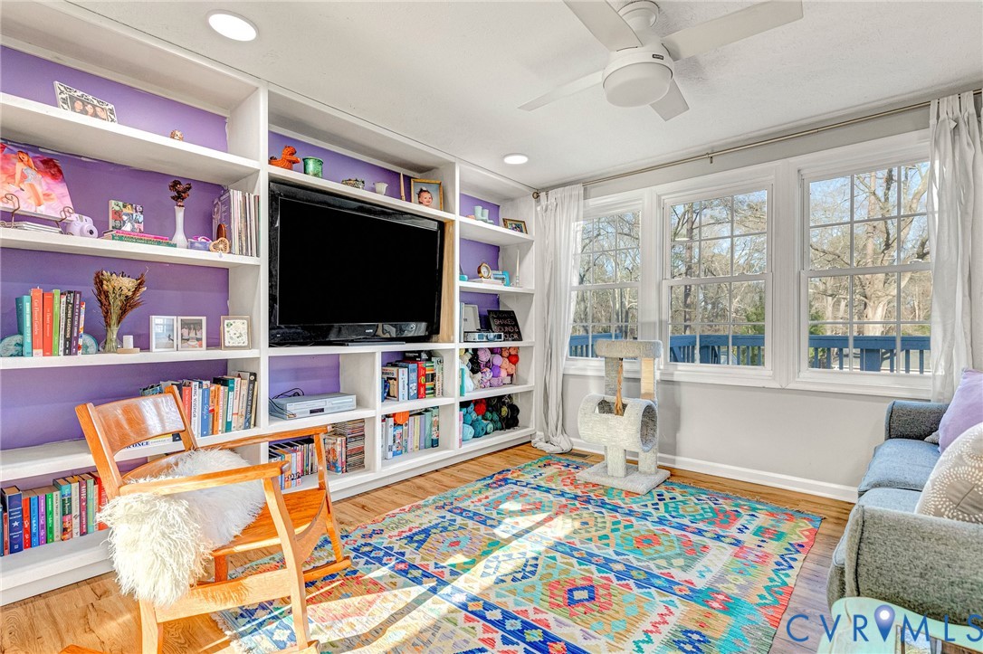 16004 Gary Avenue Chester, VA 23831 - Photo 12 of 26 a living room with furniture and a flat screen tv