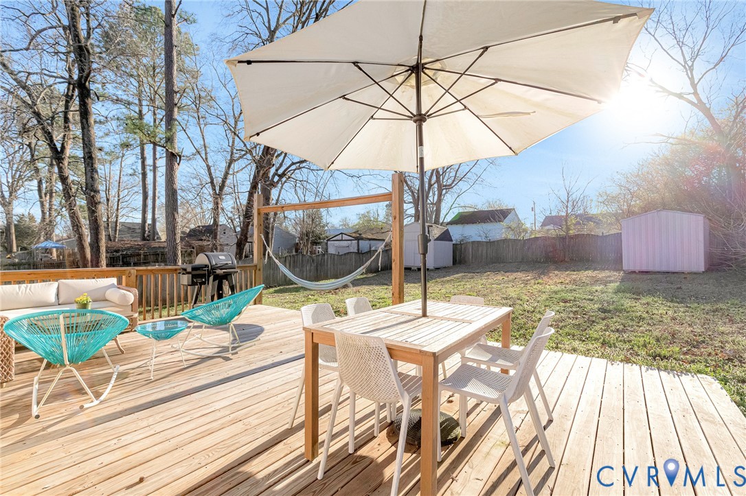 16004 Gary Avenue Chester, VA 23831 - Photo 22 of 26 a view of a backyard with sitting area
