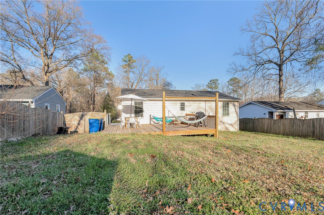 16004 Gary Avenue Chester, VA 23831 - Photo 25 of 26 a view of a house with a yard and sitting area