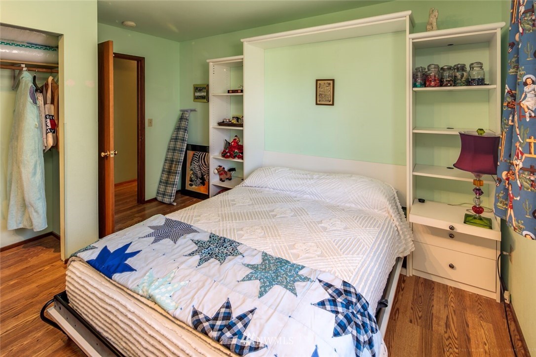 618 Kline Road Bellingham, WA 98226 - Photo 22 of 25 a bed room with a bed and a television