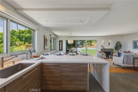 a dining room with a table and chairs