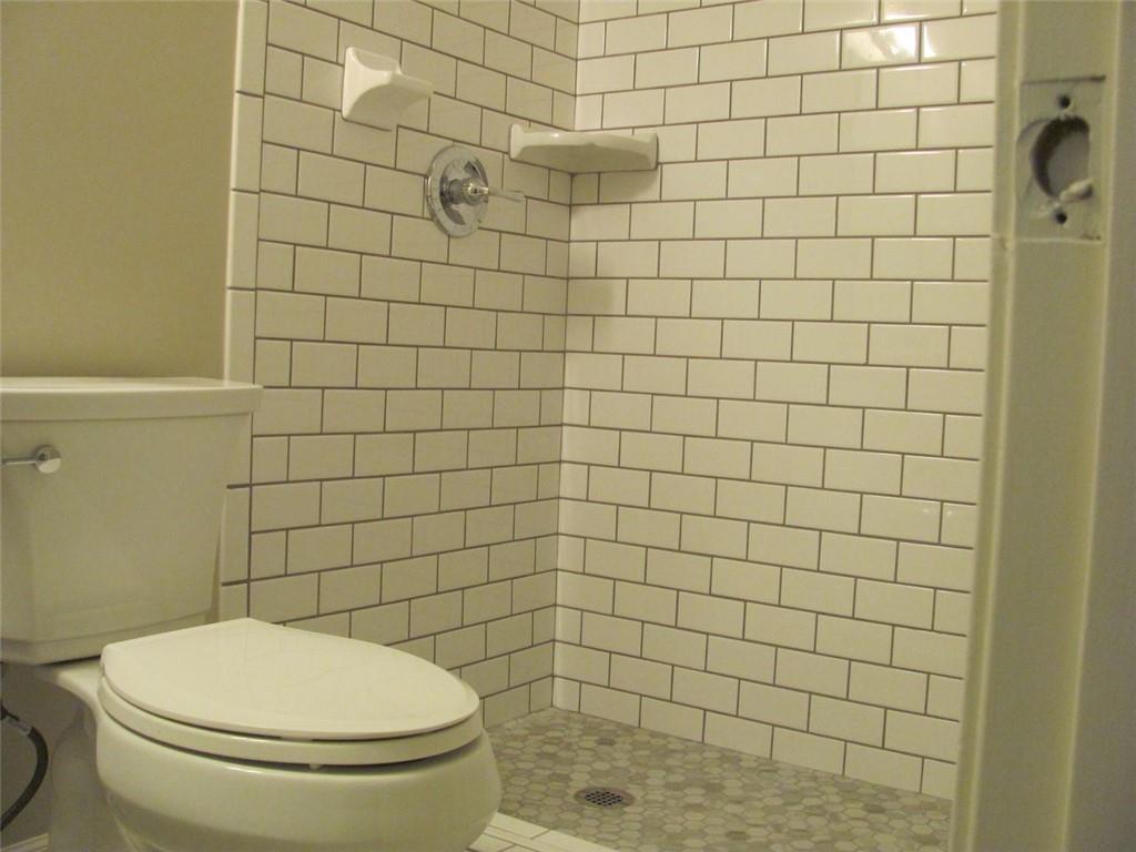 3415 Macland Road Powder Springs, GA 30127 - Photo 19 of 20 a bathroom with a toilet and a shower