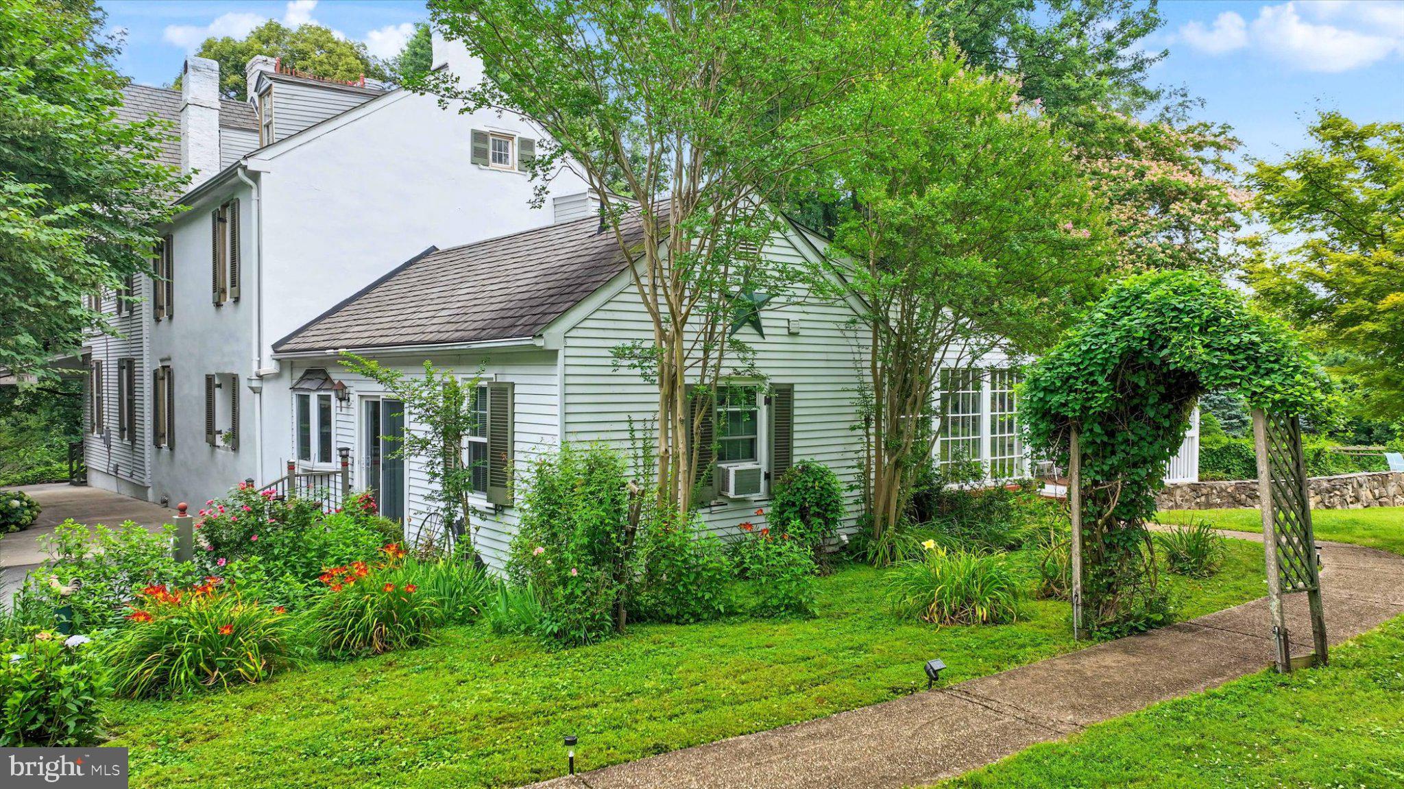 6739 South Clifton Road Frederick, MD 21703 - Photo 5 of 53 Charming home with lush gardens.