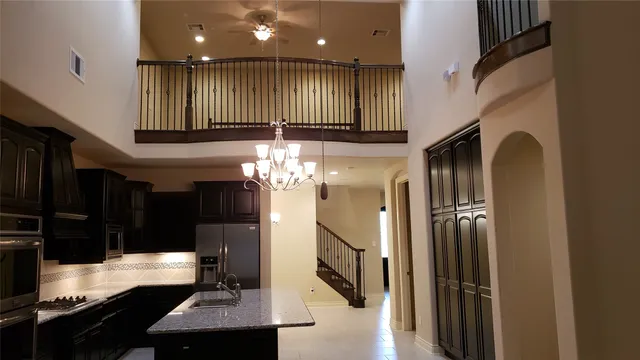 a view of a lobby with black carpet