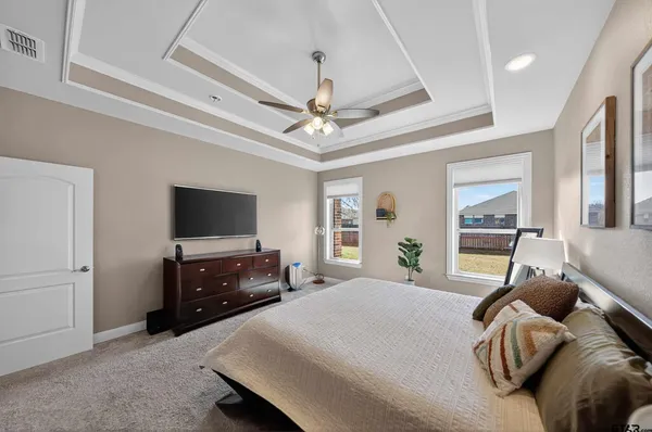 a living room with furniture fireplace and flat screen tv