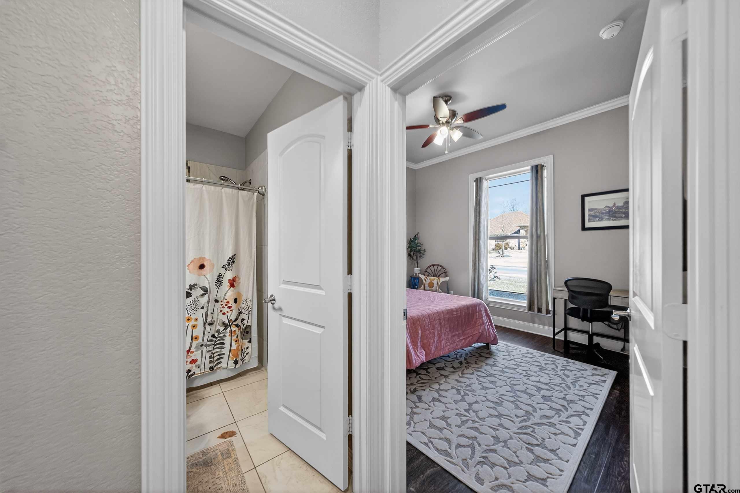 2202 Rana Park Flint, TX 75762 - Photo 33 of 47 a bedroom with a bed and wooden floor