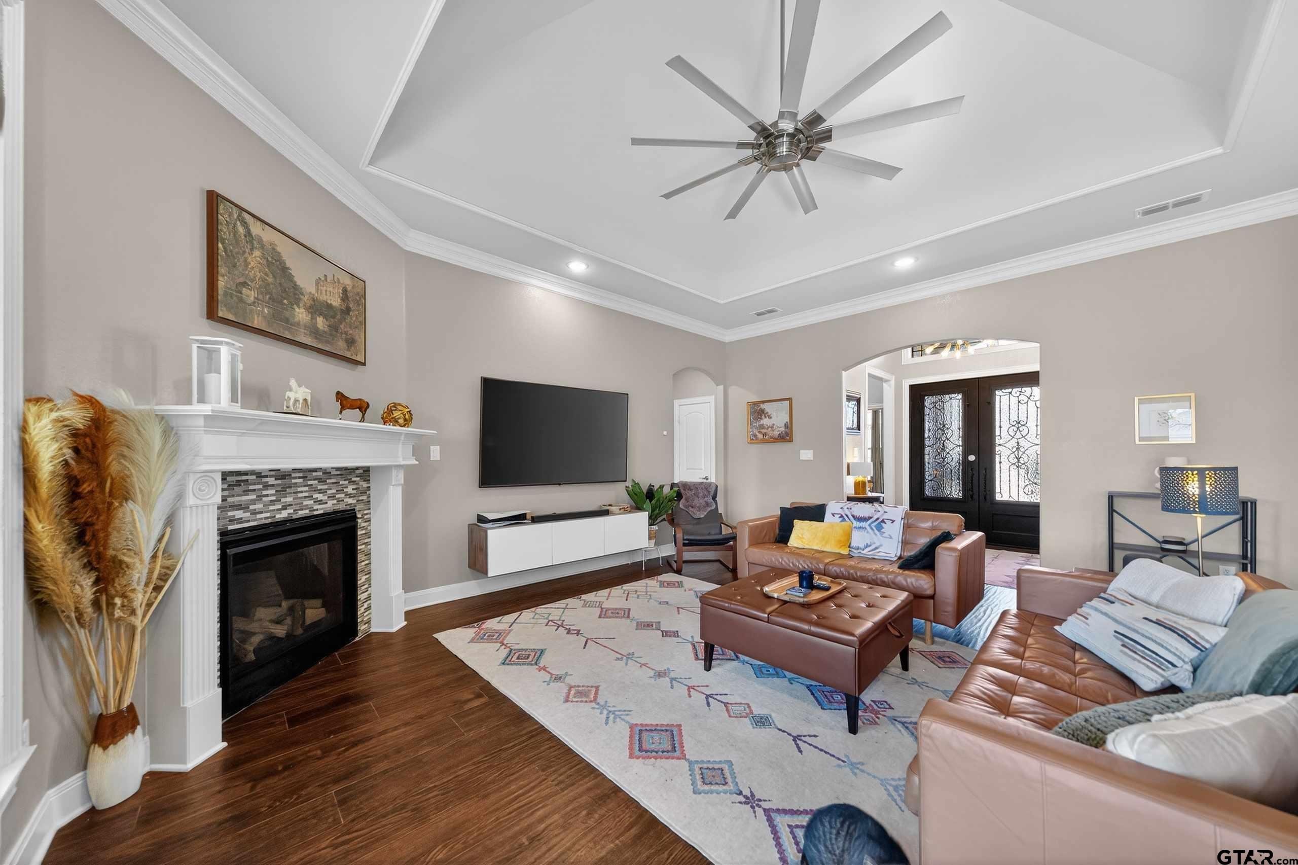 2202 Rana Park Flint, TX 75762 - Photo 35 of 47 a living room with furniture fireplace and flat screen tv