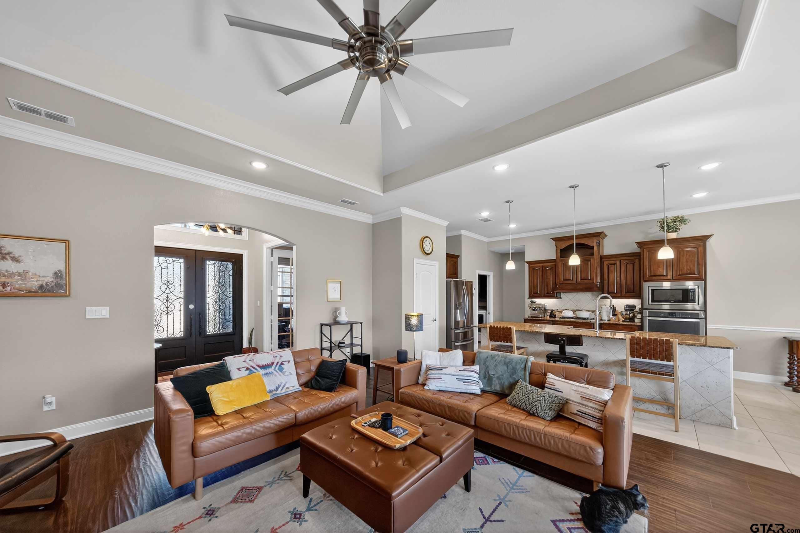 2202 Rana Park Flint, TX 75762 - Photo 41 of 47 a living room with furniture kitchen view and a chandelier