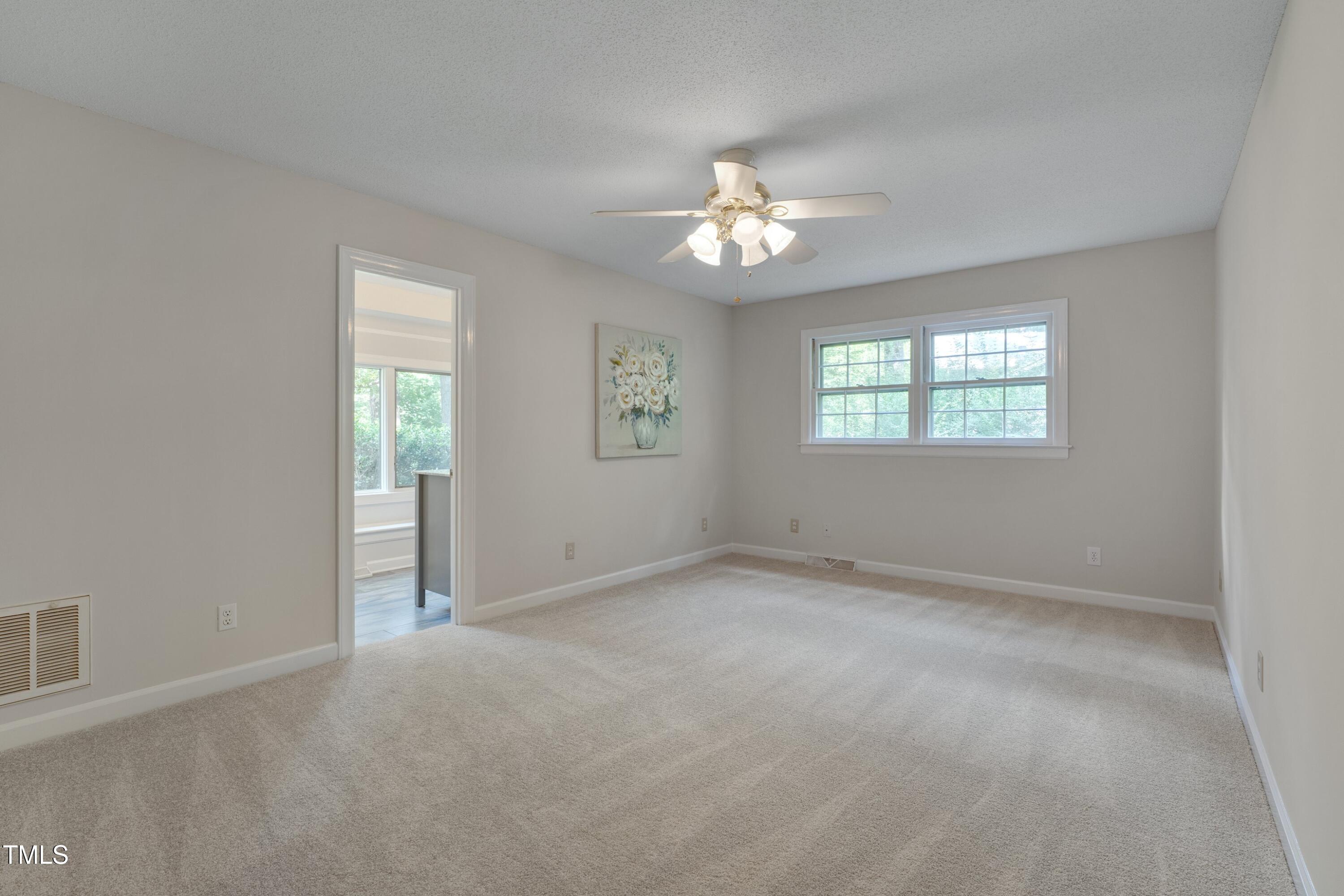 8509 Valley Brook Drive Raleigh, NC 27613 - Photo 14 of 30 Primary suite with NEW carpet & fresh paint!
