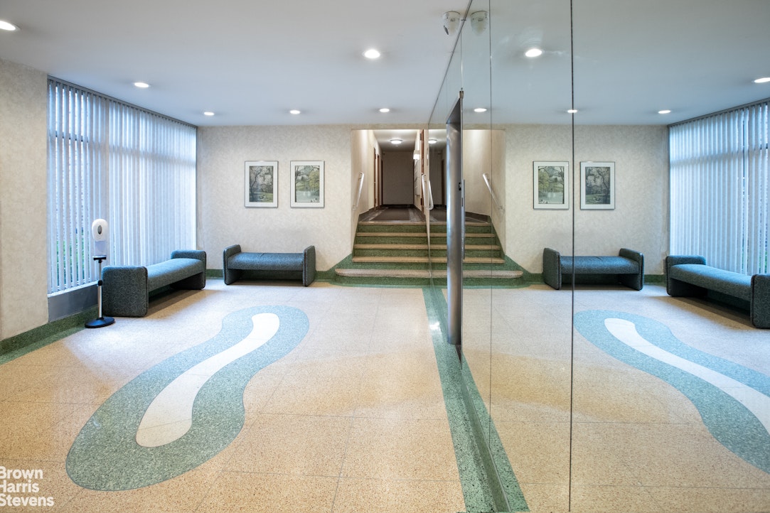 645 West 239th Street, Unit 6C Bronx, NY 10463 - Photo 13 of 18 a lobby with furniture and a rug