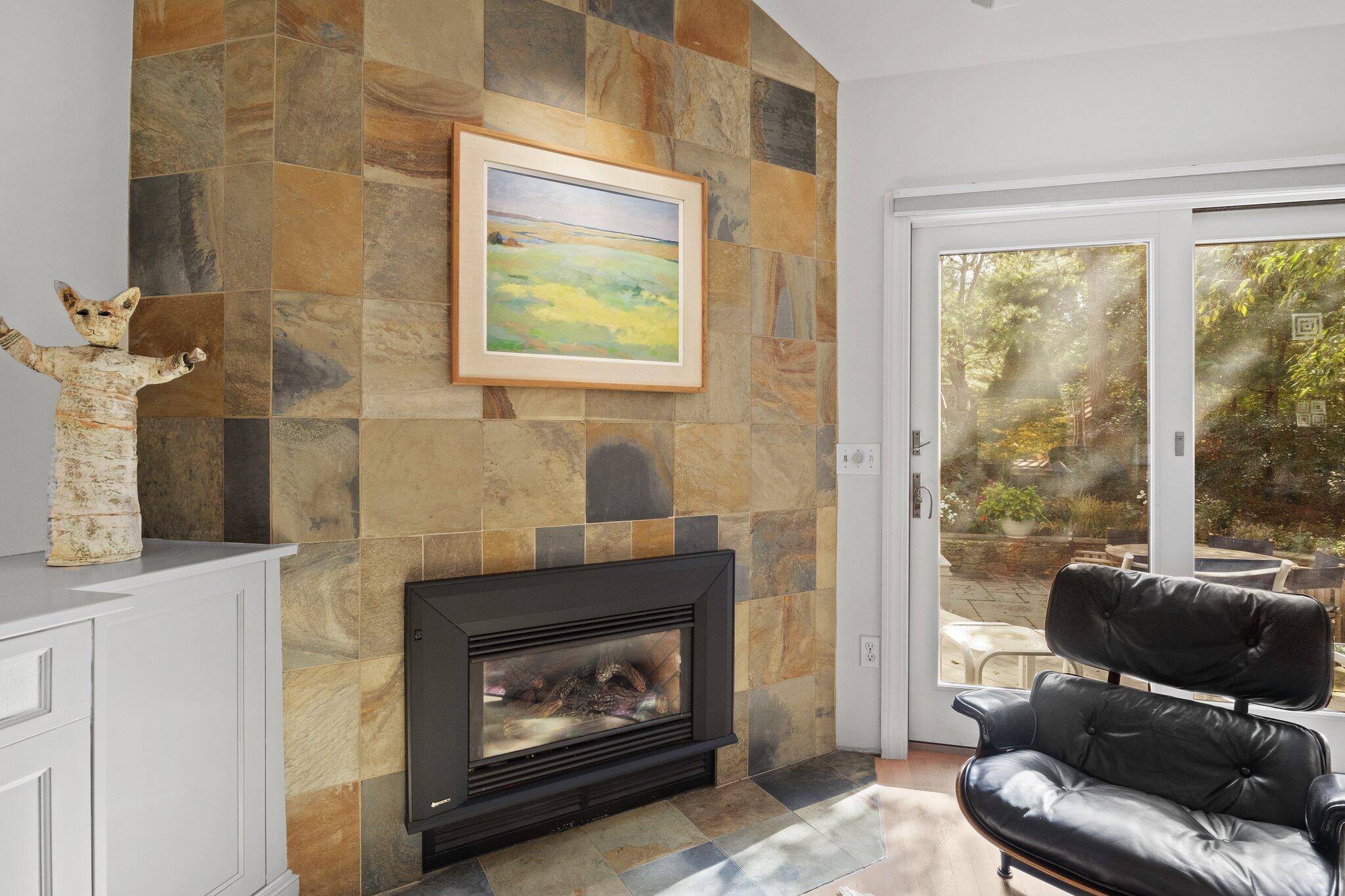 135 Locust Road Eastham, MA 02642 - Photo 9 of 88 a living room with furniture and a fireplace