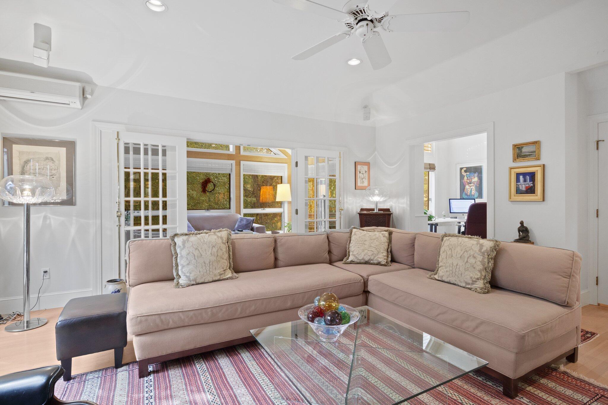135 Locust Road Eastham, MA 02642 - Photo 10 of 88 a living room with furniture and a ceiling fan