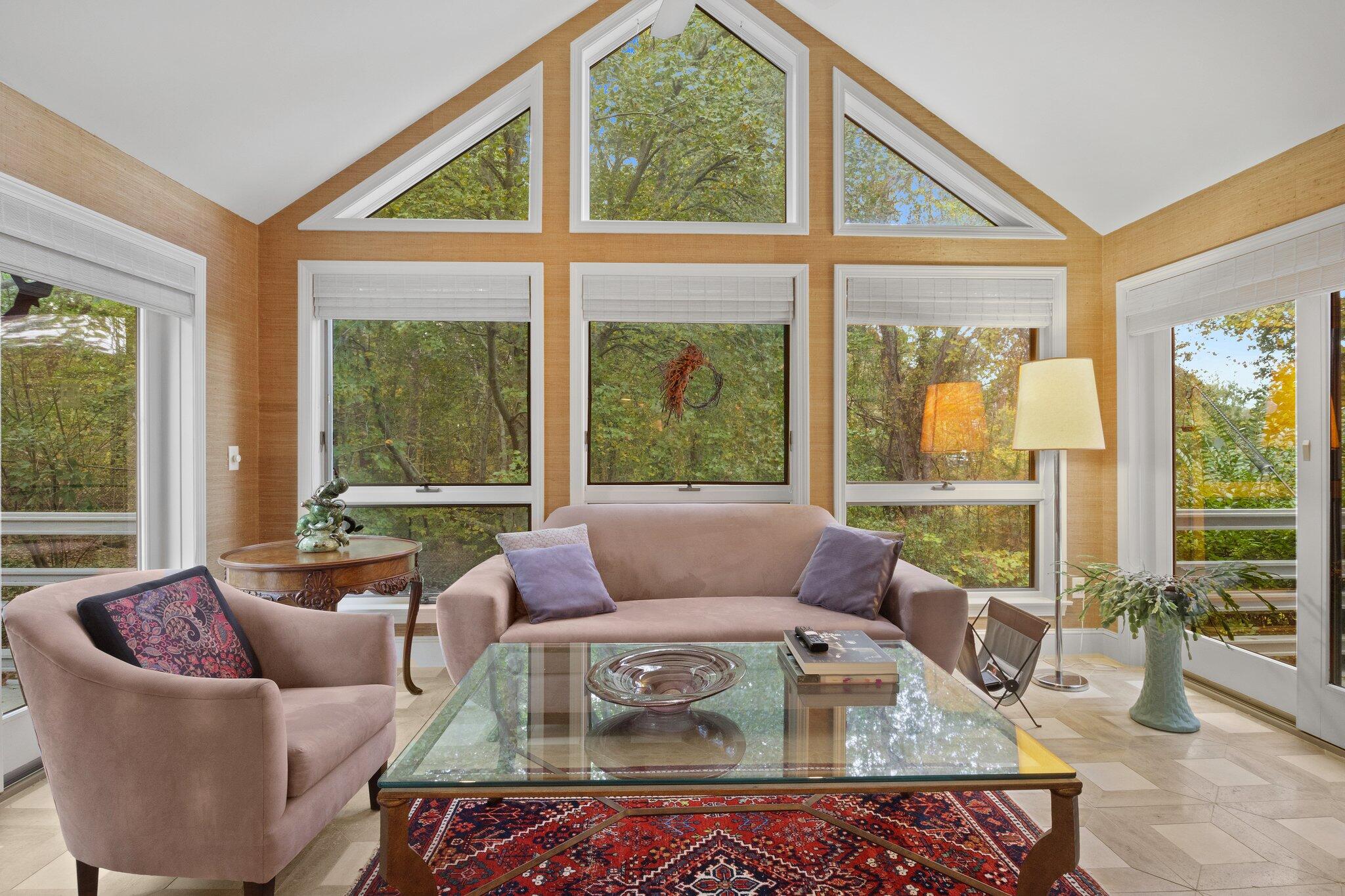 135 Locust Road Eastham, MA 02642 - Photo 15 of 88 a living room with furniture and a large window