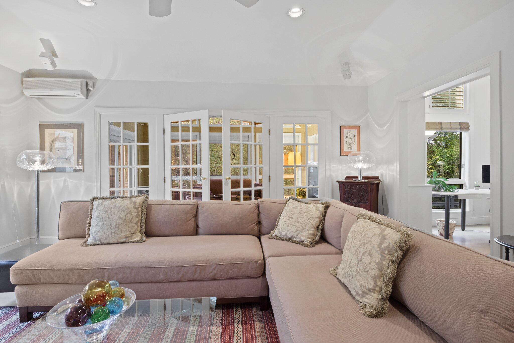 135 Locust Road Eastham, MA 02642 - Photo 18 of 88 a living room with furniture and windows
