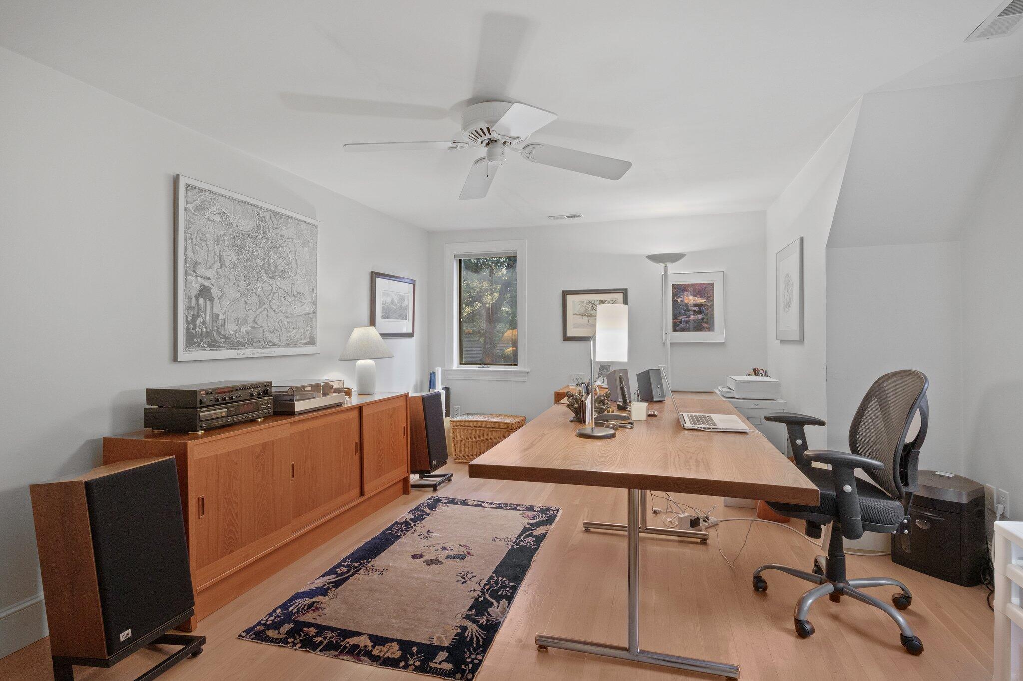 135 Locust Road Eastham, MA 02642 - Photo 47 of 88 a view of a workspace with furniture and a window