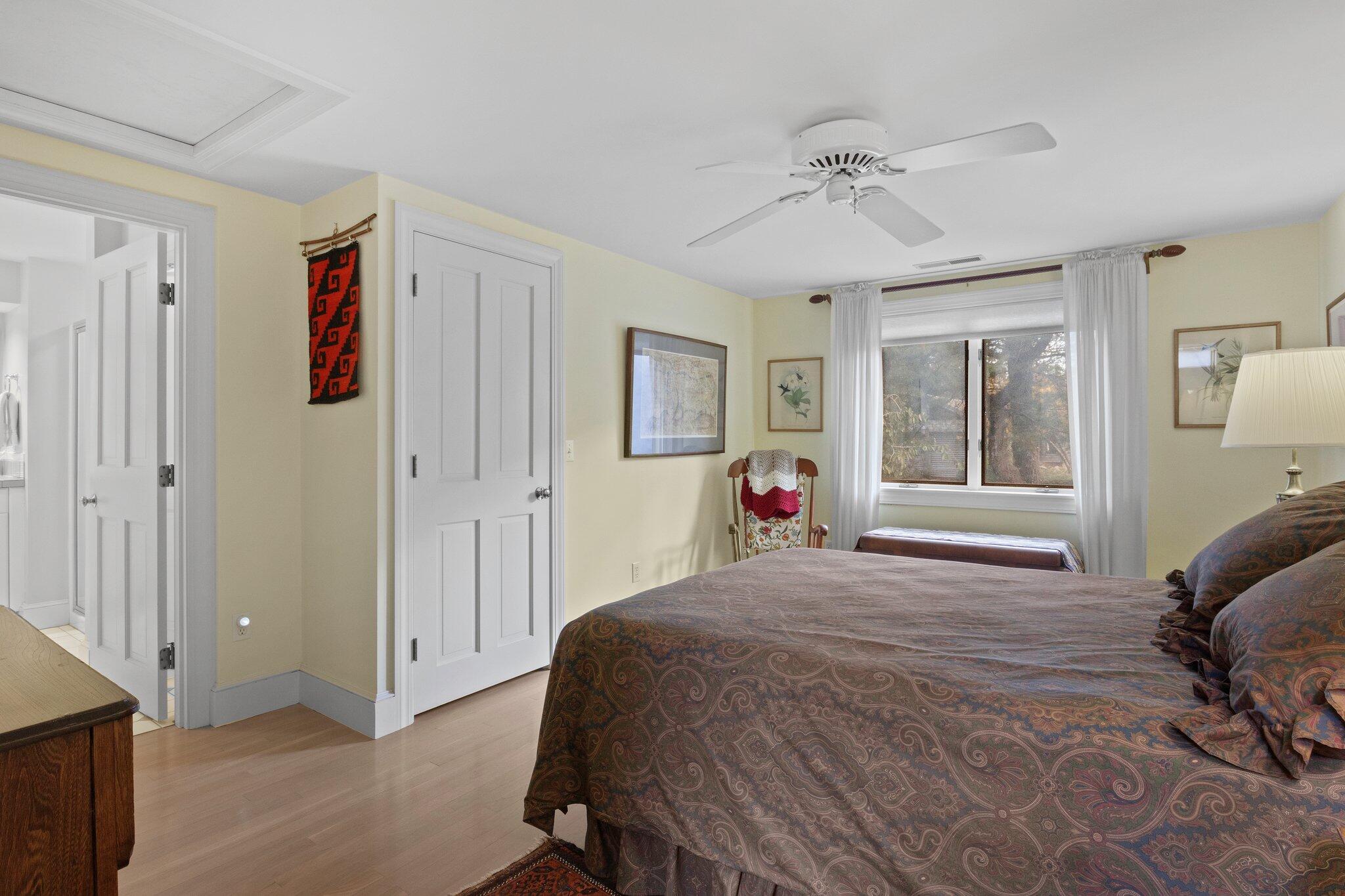 135 Locust Road Eastham, MA 02642 - Photo 51 of 88 a bedroom with a bed and a window