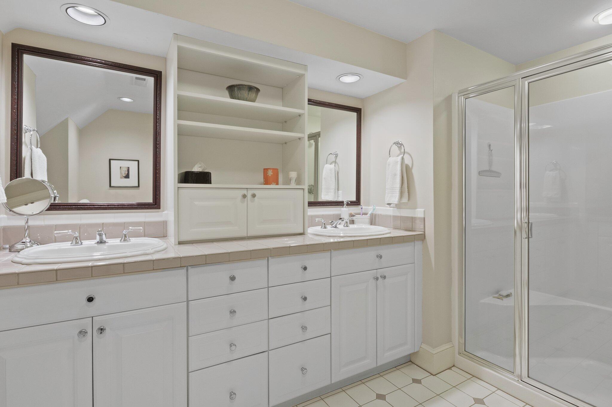 135 Locust Road Eastham, MA 02642 - Photo 53 of 88 a bathroom with double sink and a mirror