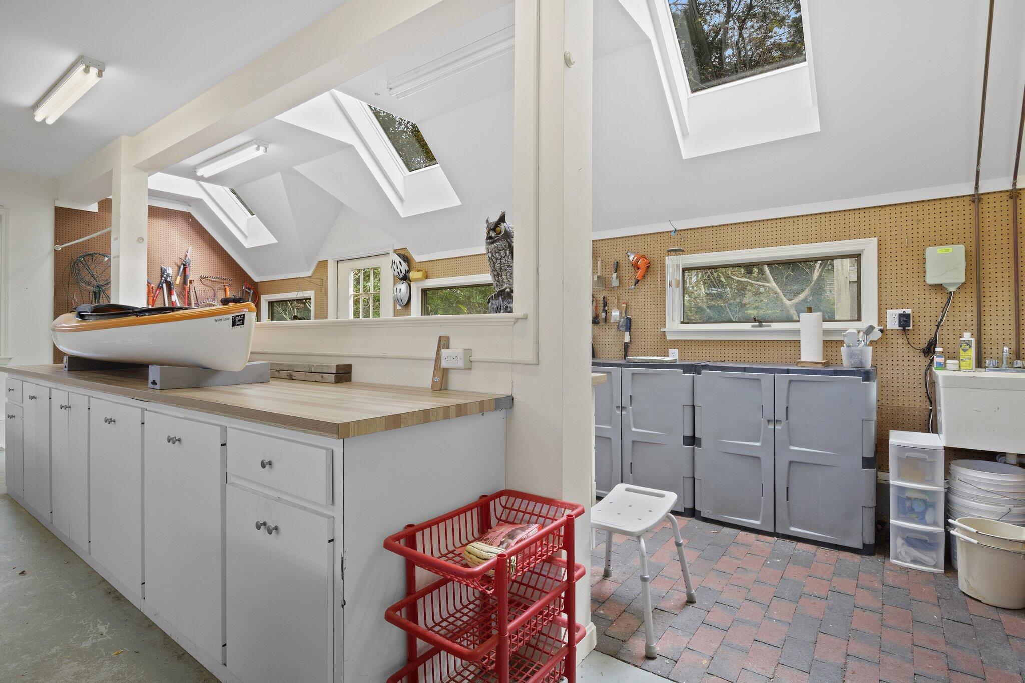 135 Locust Road Eastham, MA 02642 - Photo 65 of 88 a spacious bathroom with a double vanity sink mirror and toilet
