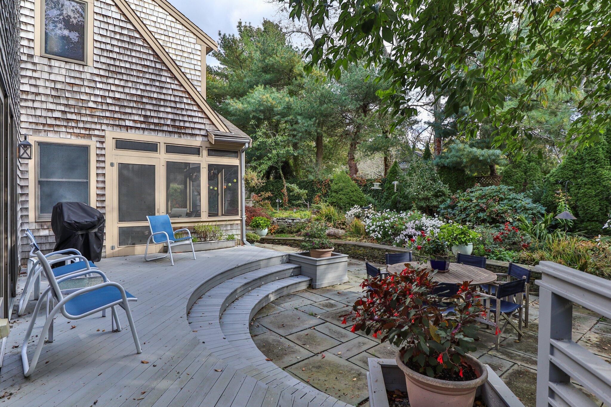 135 Locust Road Eastham, MA 02642 - Photo 79 of 88 a view of a chairs and tables in the patio