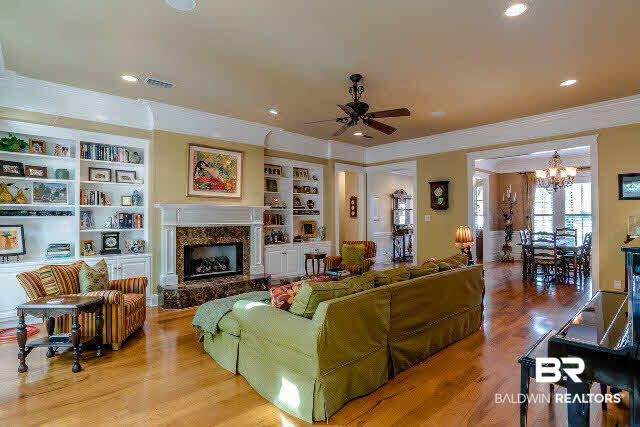 33509 Alder Circle Daphne, AL 36527 - Photo 4 of 28 Great Room with Built In Bookcases, Recessed Lighting and Wood Flooring