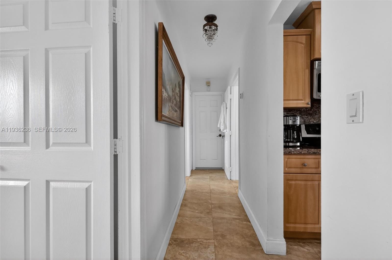 17841 Northwest 84th Court Hialeah, FL 33015 - Photo 29 of 76 a view of a hallway with closet and front door