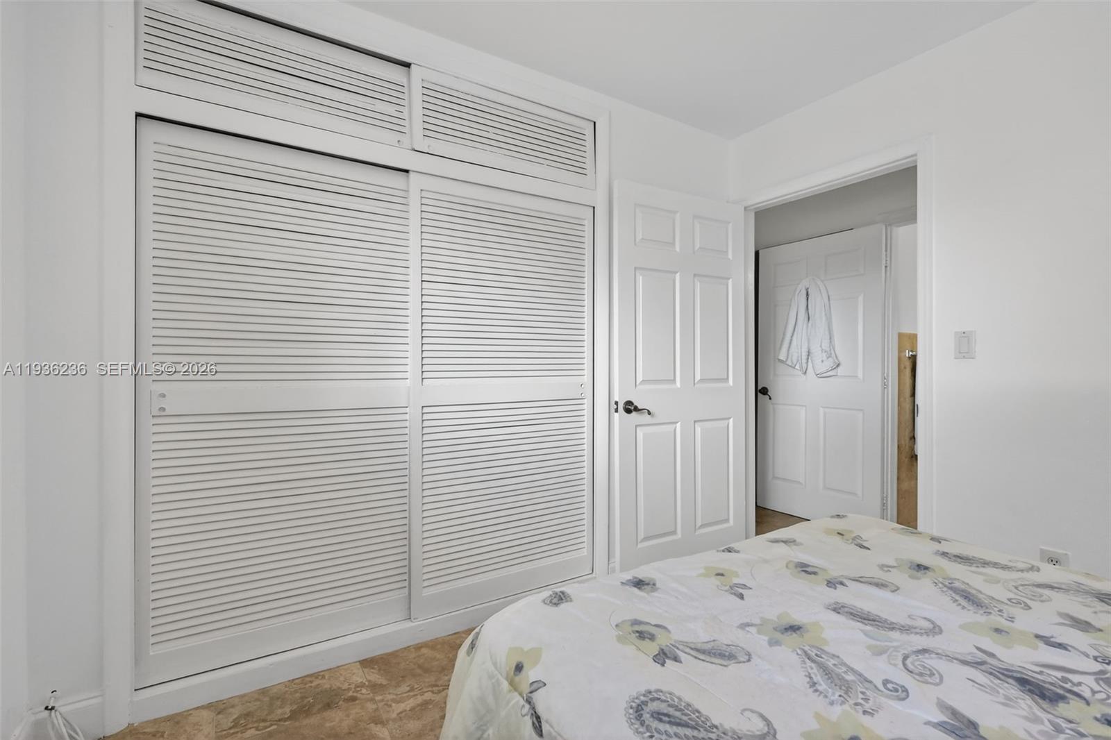 17841 Northwest 84th Court Hialeah, FL 33015 - Photo 34 of 76 a view of a bedroom with a window