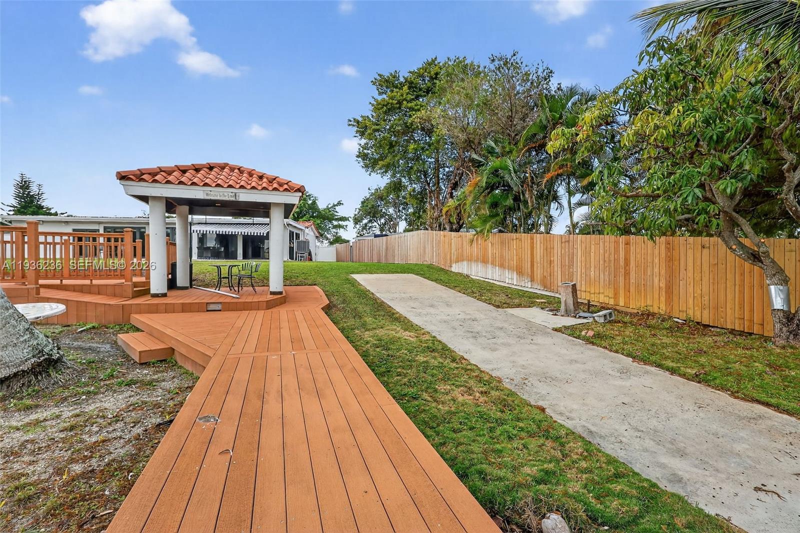 17841 Northwest 84th Court Hialeah, FL 33015 - Photo 58 of 76 a view of swimming pool with a patio