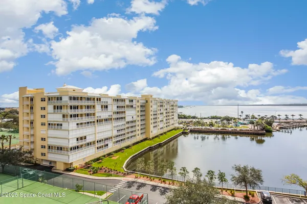 a view of a lake with building in front of it