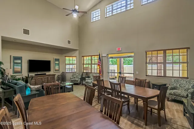 a view of a yard and a large tree