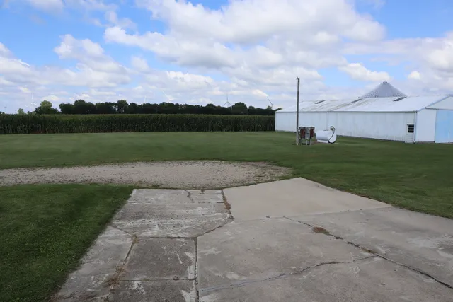 a backyard of a house with lots of green space