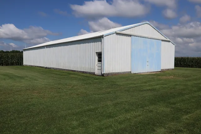 a view of a back yard of the house