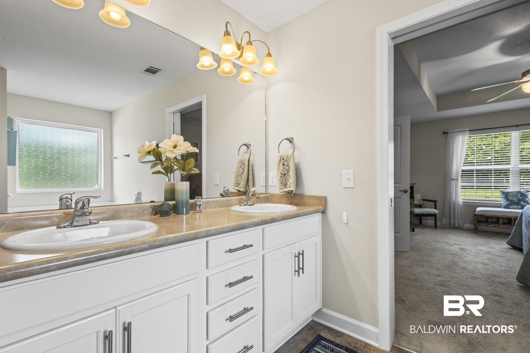 10473 Lyttleton Loop Lillian, AL 36549 - Photo 24 of 57 Bathroom featuring double vanity and a ceiling fan