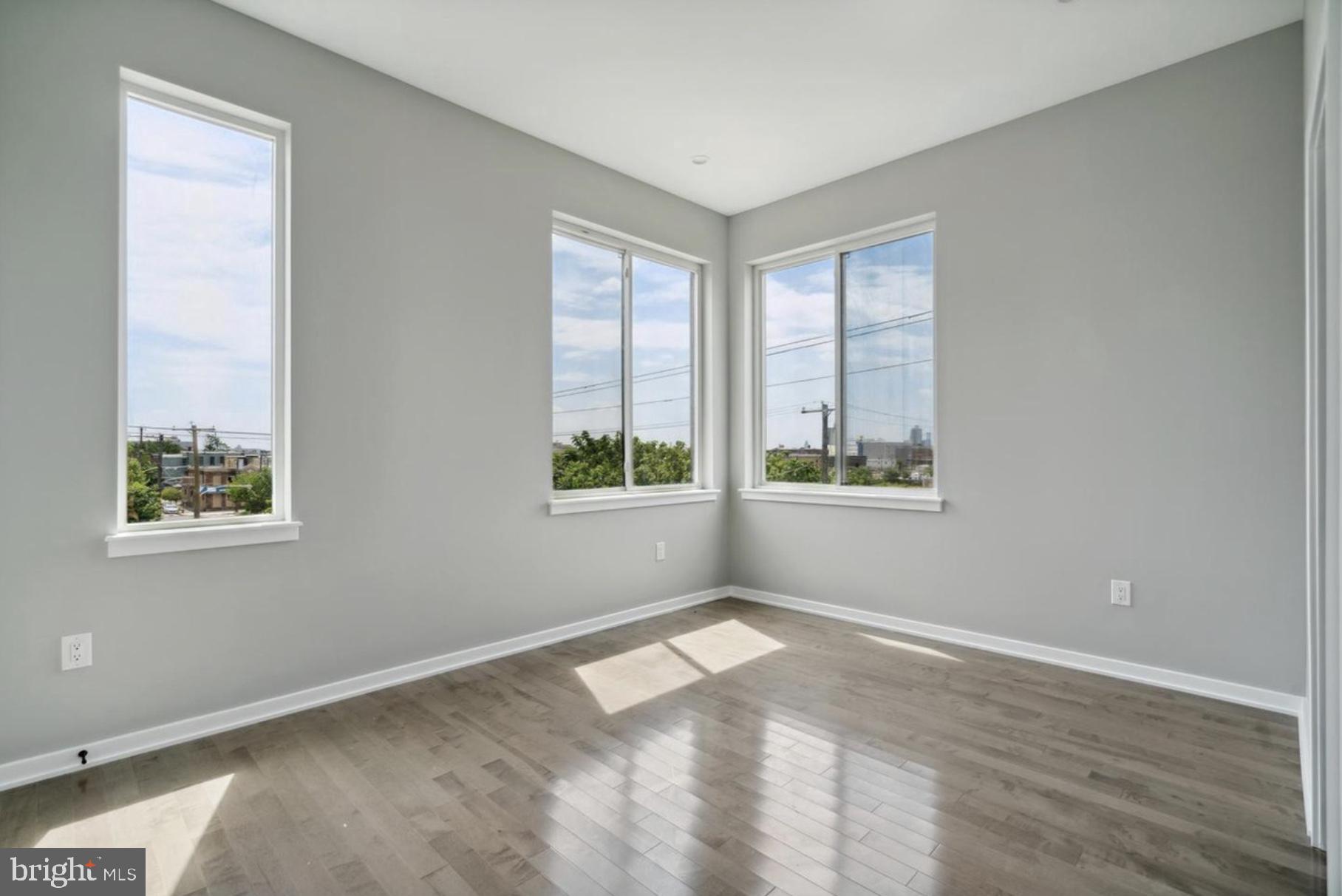 2000 North 3rd Street, Unit 1 Philadelphia, PA 19122 - Photo 9 of 10 a view of an empty room with a window