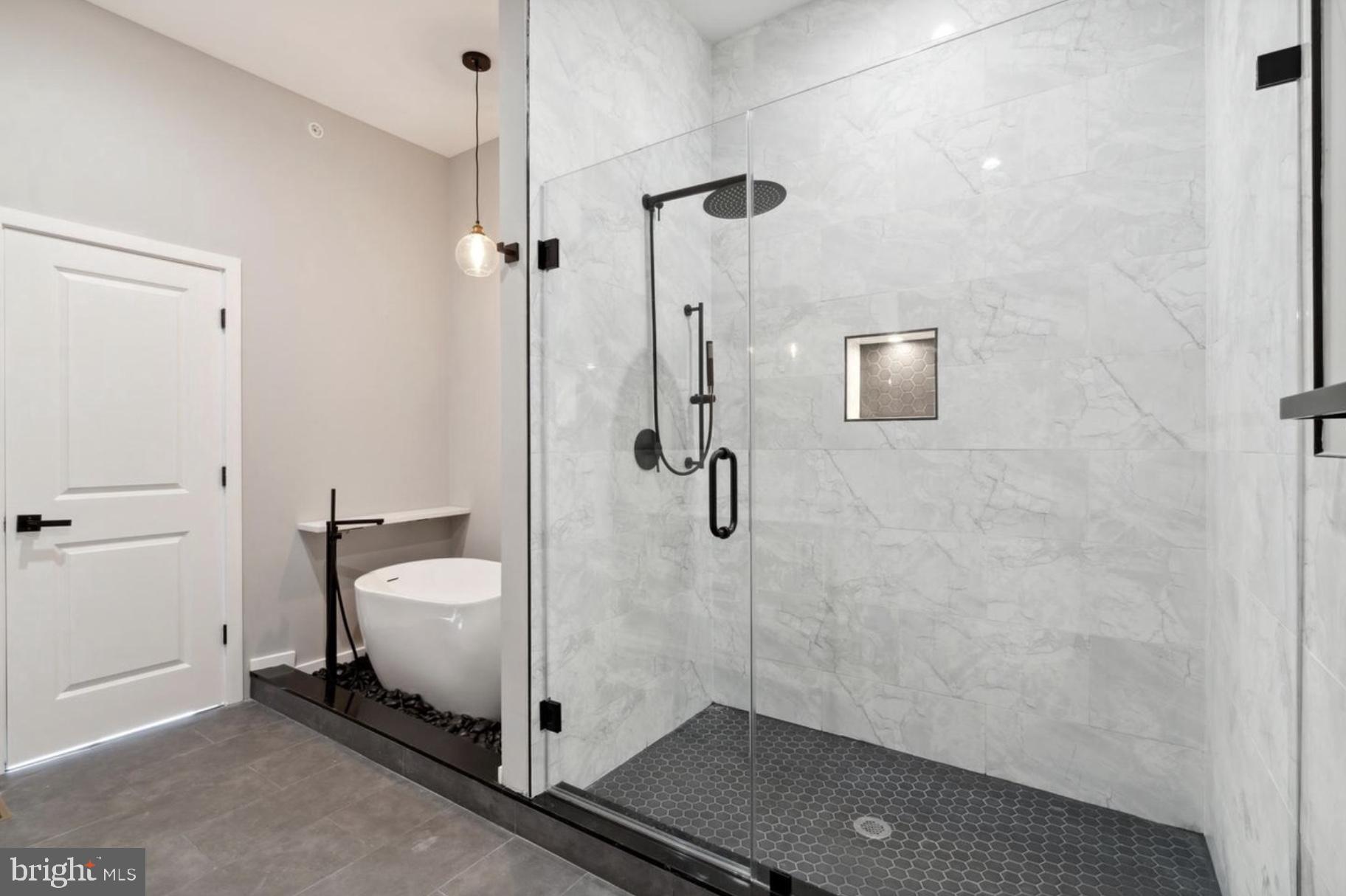 2000 North 3rd Street, Unit 1 Philadelphia, PA 19122 - Photo 10 of 10 a bathroom with a sink a toilet and shower